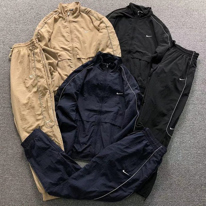 NIKE JACKET TROUSERS 132
