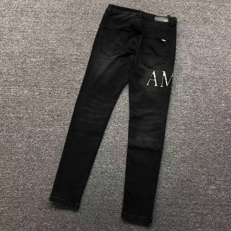 AMIRI TROUSERS 269