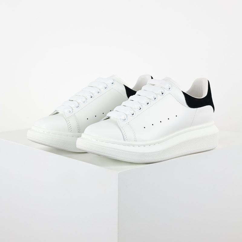 Alexander McQueen “ / ”